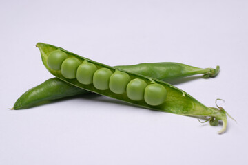green peas on a white background