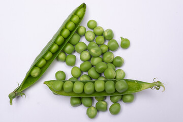 green peas on a white