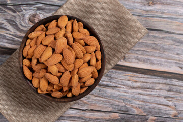 almonds in a wooden bowl