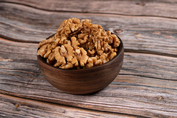 walnuts in a wooden bowl