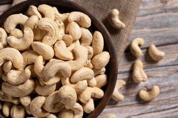 cashew nuts on a wooden background