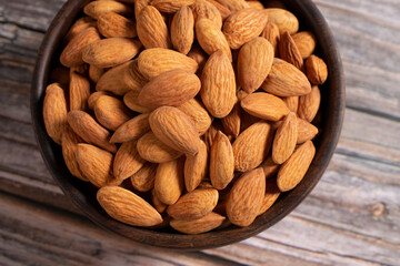 almonds in a wooden bowl