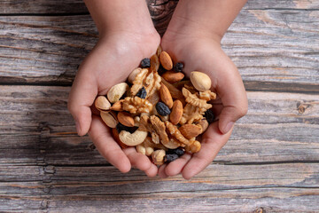 handful of nuts in the hands
