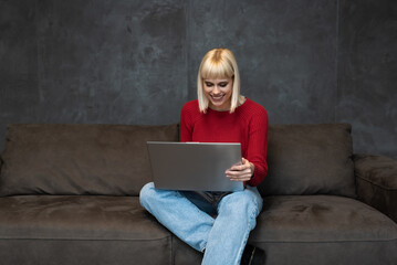 Young freelancer woman expert webmaster web designer and developer working from home on a new...