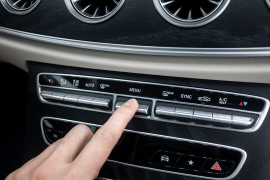 human hand climate control car Mercedes E-Class Coupe