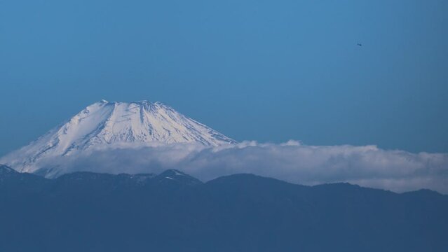 View clouds rolling over Mt Fuji from Tokyo, Japan