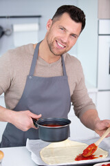 chef making pizza dough at home