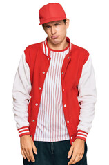 Handsome caucasian man wearing baseball uniform depressed and worry for distress, crying angry and afraid. sad expression.