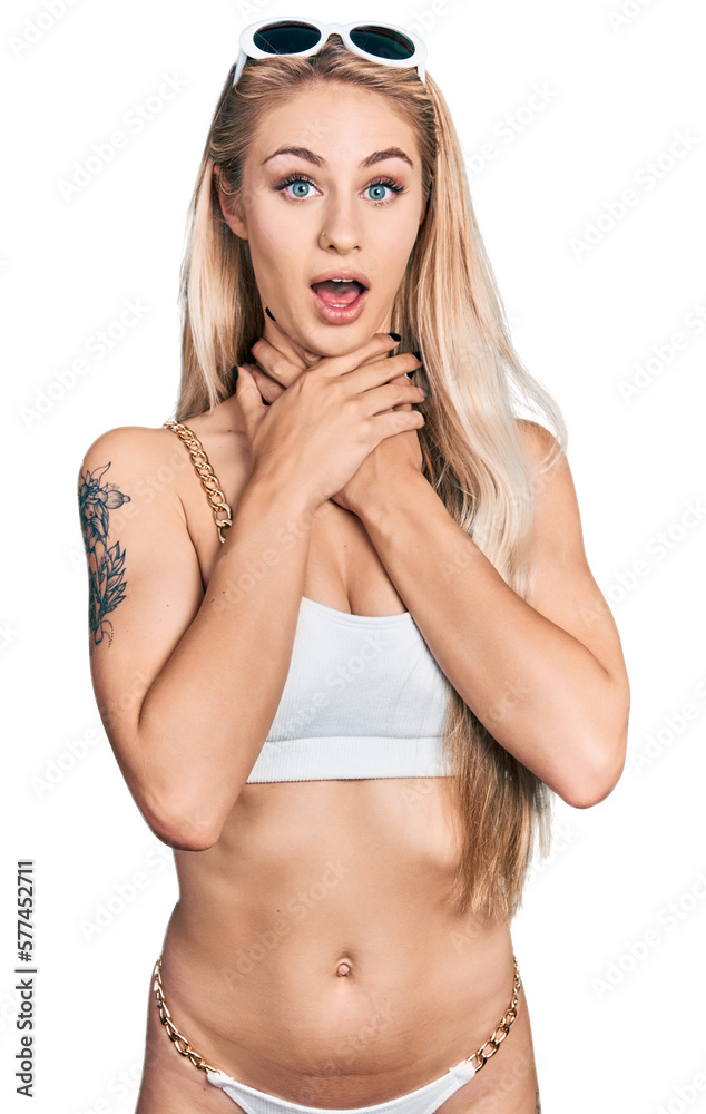 Canvas Prints Beautiful young blonde woman wearing bikini shouting and suffocate because painful strangle. health problem. asphyxiate and suicide concept.