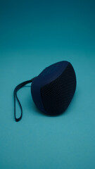 portable speaker is photographed at an angle of 45 degrees