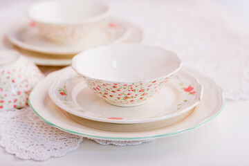 Closeup of porcelain plates and bowls