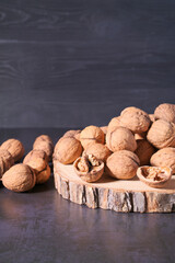 Handful of walnuts on a wooden board