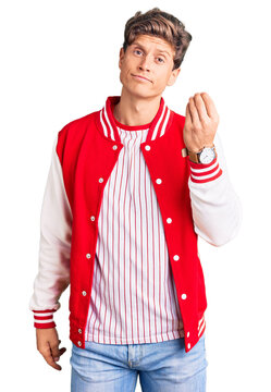 Young handsome man wearing baseball uniform doing italian gesture with hand and fingers confident expression