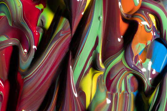 Flow of thick colorful paint