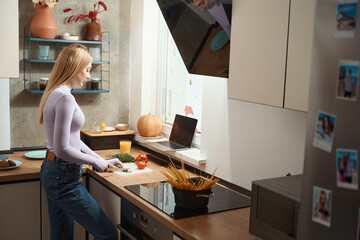 Housewife involved in preparing salad for lunch