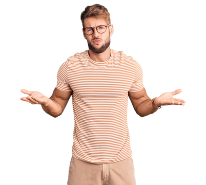 Young caucasian man wearing casual clothes and glasses clueless and confused with open arms, no idea concept.