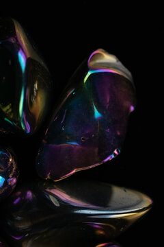 Damaged stones with iridescent surface
