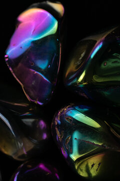 Damaged stones with iridescent surface