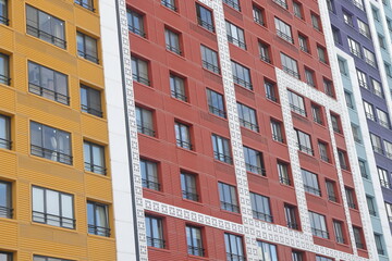 Fototapeta premium MOSCOW, RUSSIA - March 2023: Facades of new buildings of a residential complex in Butovo, Moscow, Russia. Modern style in architecture. House in a residential area of Moscow.