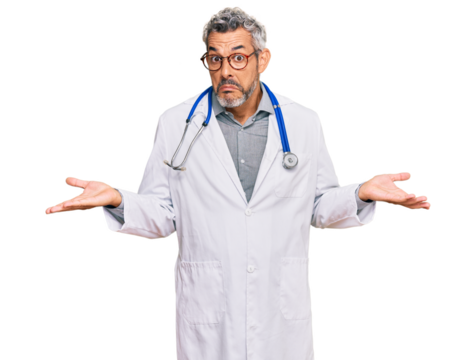 Middle age grey-haired man wearing doctor uniform and stethoscope clueless and confused expression with arms and hands raised. doubt concept. - Powered by Adobe