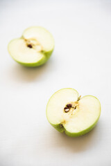 Slice of fresh apple green fruit on a white background. Healthy eating  nutritious food