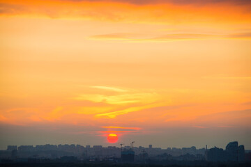 Sunset sky with sunset clouds on sunset sky. Kyiv city, Ukraine