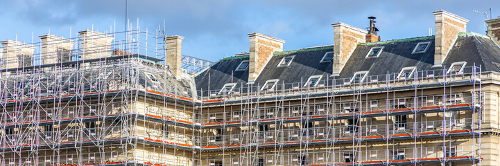 Scaffolding on a rooftop for the renovation work on the building at 36 quai des orfevres in Paris