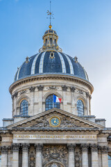 Fototapeta na wymiar Dome of the Institut de France building on the Quai de Conti in Paris, France