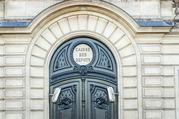 Entrance door of the Caisse des Depots headquarters in Paris, France