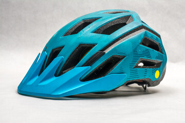 Teal mountain bike helmet with visor