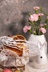 Easter cake with a white rabbit on a dark background