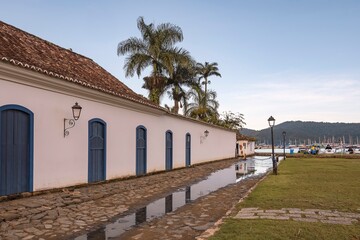 Paraty, Brazil. Houses with colorful doors and windows from the colonial period and a stone street...