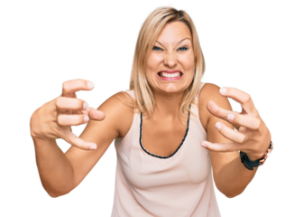 Middle age caucasian woman wearing casual clothes shouting frustrated with rage, hands trying to strangle, yelling mad