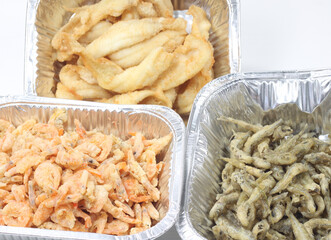 a mixture of fried seafood fish takeaway-