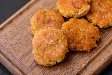 Delicious hearty vegetarian or vegan dish in the form of cutlets or patties - obrazy, fototapety, plakaty