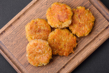Delicious hearty vegetarian or vegan dish in the form of cutlets or patties - obrazy, fototapety, plakaty
