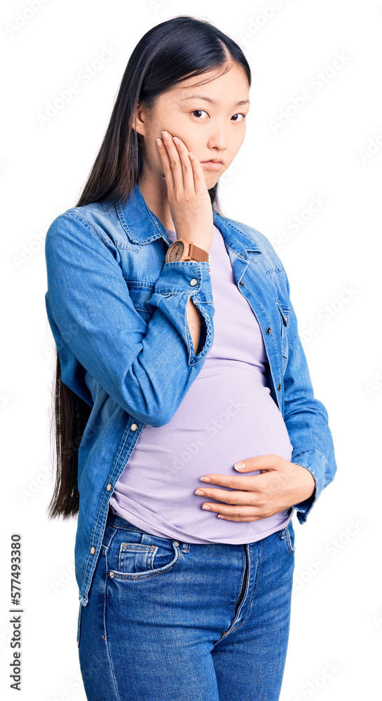 Sticker young beautiful chinese woman pregnant expecting baby thinking looking tired and bored with depressi