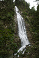 Plakat waterfall in the mountains