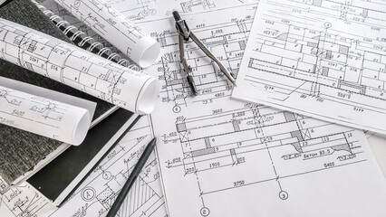 Architects concept, engineer architect designer freelance work on start-up project drawing, construction plan architect design working drawing sketch plans blueprints and making construction model