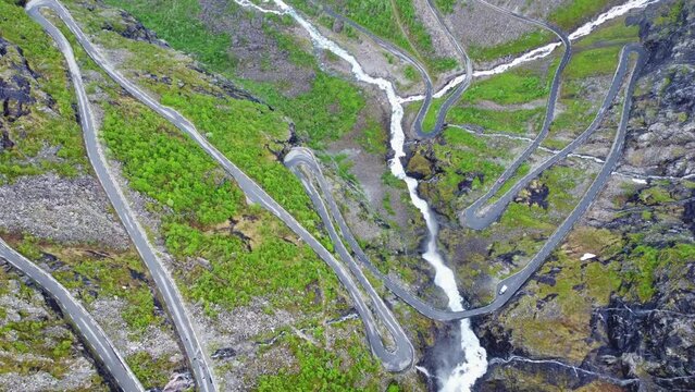 Aerial view of a winding road and valley on the famous Trollstigen mountain pass road in Norway	
