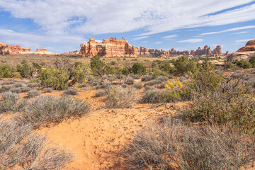 hiking the chesler park loop trail in the needles in canyonlands national park, usa