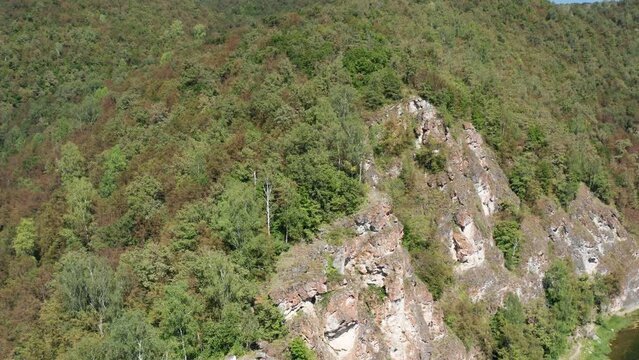 Southern Urals, rocks by the mountain river Zilim near the Kinderlin cave. Aerial view.