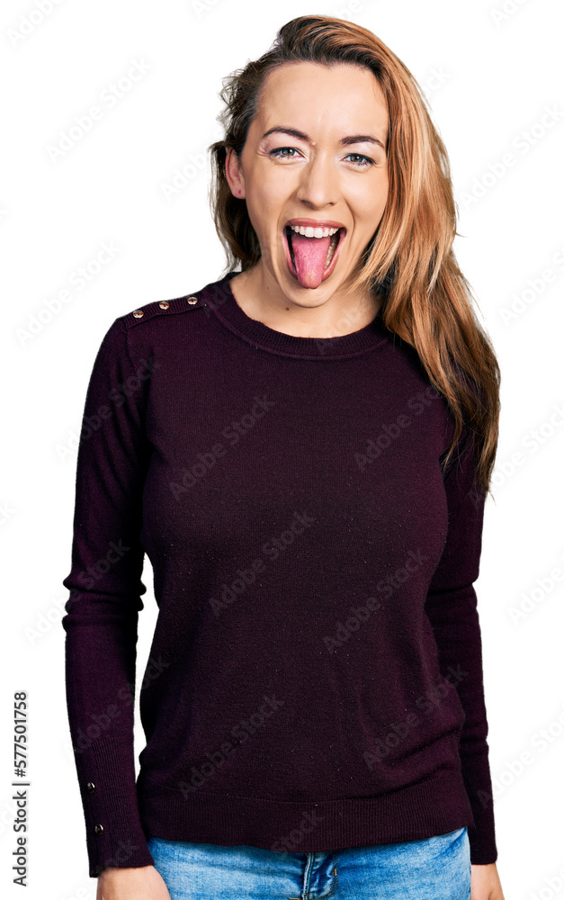 Canvas Prints young caucasian woman wearing casual clothes sticking tongue out happy with funny expression. emotio