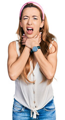 Young caucasian woman wearing casual style with sleeveless shirt shouting suffocate because painful...