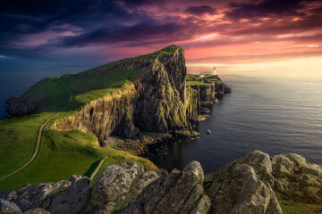 The last sunbeam at Neist Point Lighthouse. Neist Point is one of the most famous lighthouses in Scotland and can be found near the township of Glendale. Scotland, United Kingdom