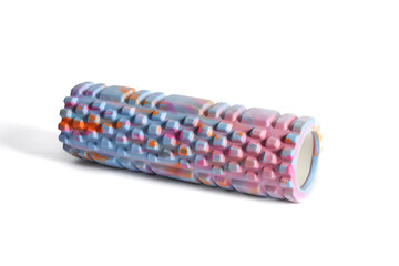 A blue foam massage roller isolated on a white background. Foam rolling is a self myofascial release technique. Gym fitness equipment.
