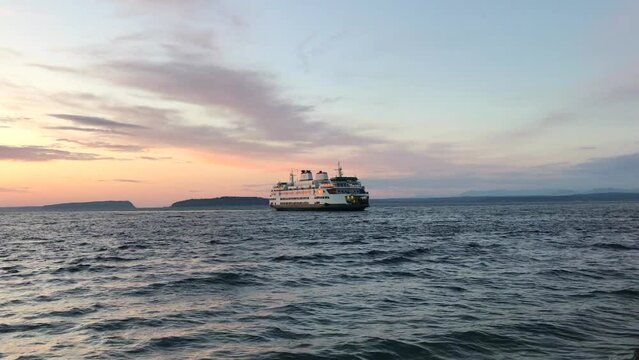 A ferry crossing at sunset