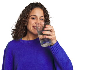 A young caucasian woman with athletic build and sportswear holding a glass of water in her hand, taking a refreshing break and promoting healthy hydration habits.