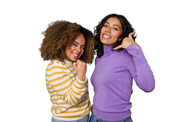Two female friends isolated in studio showing a mobile phone call gesture with fingers.