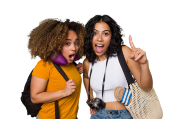 Two diverse friends on a beach vacation with vintage camera, beach bag, and travel pillow having an idea, inspiration concept.